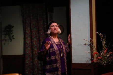 Suzanne Young (Madame Arcati) in Spotlighters Theatre's production of Blithe Spirit. Photo credit: Spotlighters Theatre/Shealyn Jae Photography.