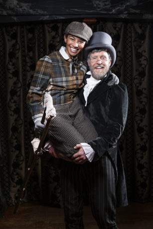 Constance Swain (Tiny Tim) and Patrick Earl (Ebenezer Scrooge) in American Shakespeare Company's 2018 production of A Christmas Carol. Photo by Lauren Parker.