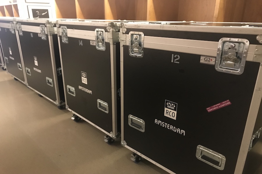 Royal Concertgebouw instrument cases lined up and ready to be unpacked. Any guesses on what instruments could be inside? Photo by Samantha Pollack. 