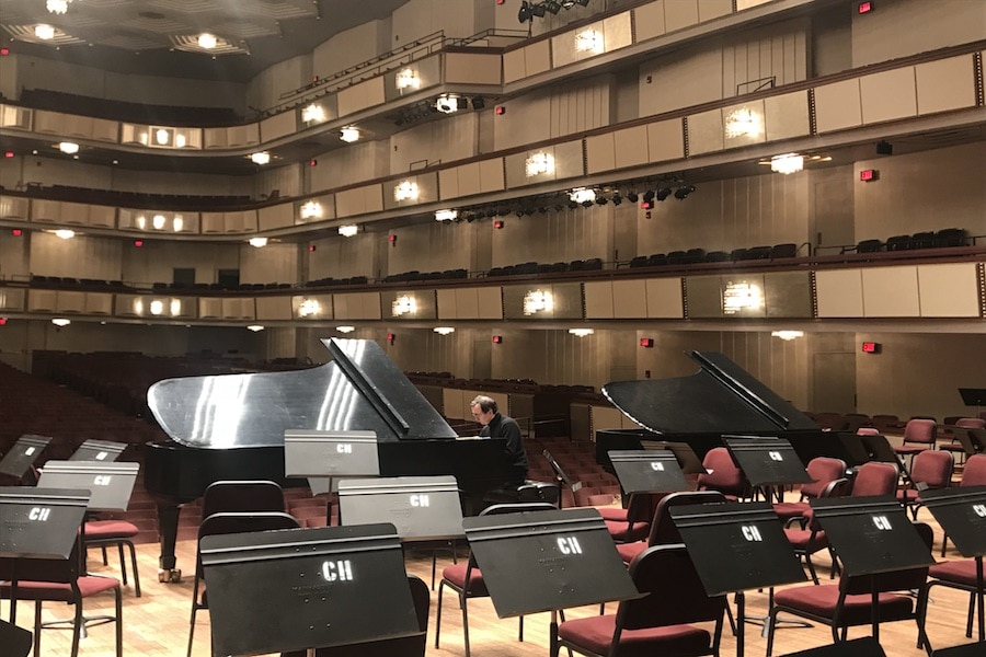 Pianist Pierre-Laurent Aimard tests out the acoustics in the hall before the concert. Could he be playing the program piece Piano Concerto No. 5 in E-flat major, Op. 73 (“Emperor”) by Beethoven, or Chopsticks? The world may never know! Photo by Samantha Pollack. 