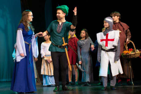 Robin Hood, played by Xander Tilock, greets Maid Marian, played by Quinn Sumerlin. Photo by Cindy Kane Photography.