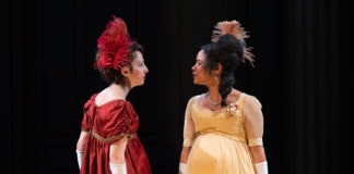 Rebekah Brockman as Becky Sharp and Maribel Martinez as Amelia Sedley in 'Vanity Fair' at the Shakespeare Theatre Company. Photo by Scott Suchman.