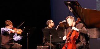 L-R: Leonid Sushansky (violin), Carlos Cesar Rodriguez (piano) and Sean Neidlinger (cello) of the National Chamber Ensemble perform 'The Viennese Classics.' Photo by Angela S. Anderson.