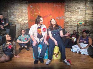 Stephanie Blakely (Anna Maria) sits with Ryan Walker (Jesus) during the song “Day by Day"' Photo by Maureen Hagerman.