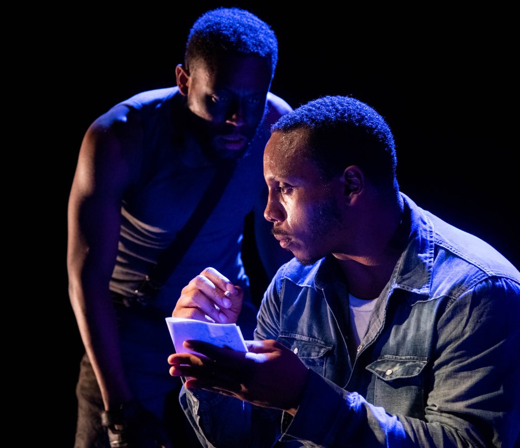 Vaughn Ryan Midder as the Black Rat and Clayton Pelham, Jr. as Bigger Thomas in Mosaic Theater Company's production of 'Native Son.' Photo by Stan Barouh.