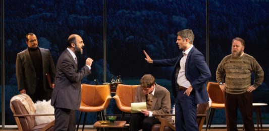 Ahmad Kamal (Hassan Asfour), Maboud Ebrahimzadeh (Ahmed Quire), Gregory Wooddell (Ron Pundak), Juri Henley-Cohn (Uri Savir), and Sasha Olinick (Yair Hirschfeld) in Round House Theatre’s current production of 'Oslo.' Photo by Lilly King.