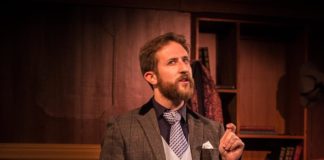 Adam Ressa (Watson) in City of Fairfax Theatre Company's production of 'The (curious case of the) Watson Intelligence.' Photo by Rebecca Kalant-Kelling.