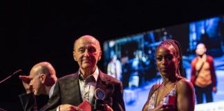 Co-hosts Rick Hammerly and Felicia Curry with Victor Shargai, founding chair of theatreWashington's board of directors., at the 2019 Helen Hayes Awards. Photo by Mukul Ranjan.