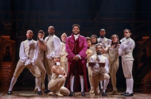 Bryson Bruce, center, with cast of Hamilton. Photo by Joan Marcus.
