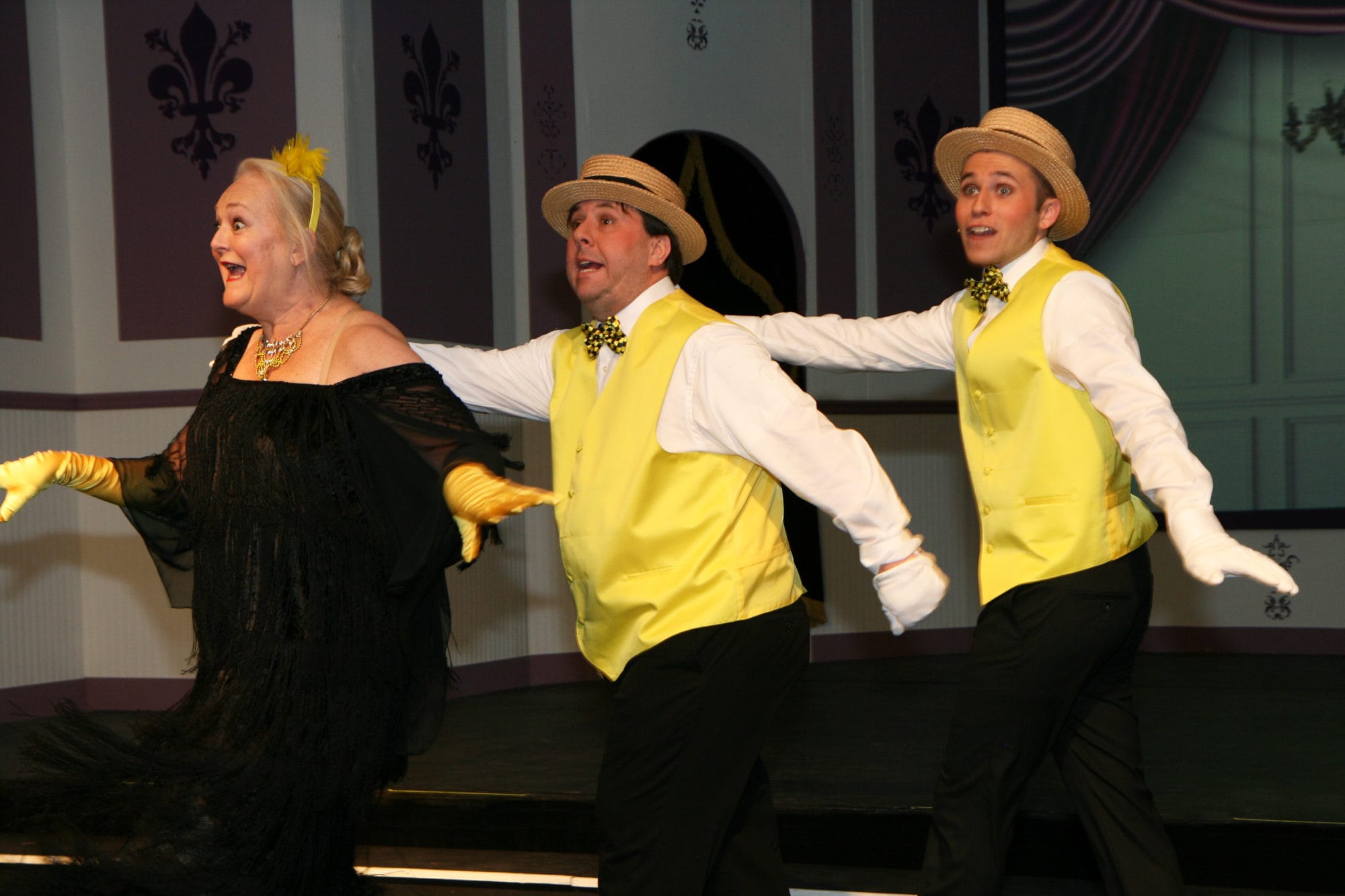 Missi Tessier, Matt Craun, and Joe Lilek perform "Be My Little Baby Bumblebee" in The British Players' Old Time Music Hall. Photo by Simmons Design.