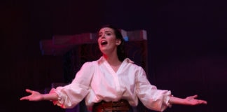 Robin Weiner as Belle in The Arlington Players' production of 'Beauty and the Beast.' Photo by Rich Farella.