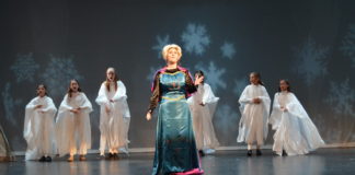 Elsa (Lucy Rocchio) performs "Let it go" in Encore's production of Disney's 'Frozen Jr.' Photo by Aileen Christian.