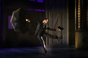 Rhett Guter as Don Lockwood in 'Singin' in the Rain' at Olney Theatre Center. Photo by Stan Barouh Photography.