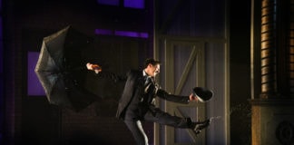 Rhett Guter as Don Lockwood in 'Singin' in the Rain' at Olney Theatre Center. Photo by Stan Barouh Photography.