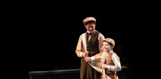 Ethan Van Slyke (Davey) and Josiah Smothers (Les) in 'Newsies' at Arena Stage. Photo by Margot Schulman.