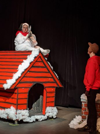 Katherine Blondin as Snoopy and Nick MacFarlane as Charlie Brown in Prince William Little Theatre's production of 'A Charlie Brown Christmas.' Photo by Melissa Jo York-Tilley.